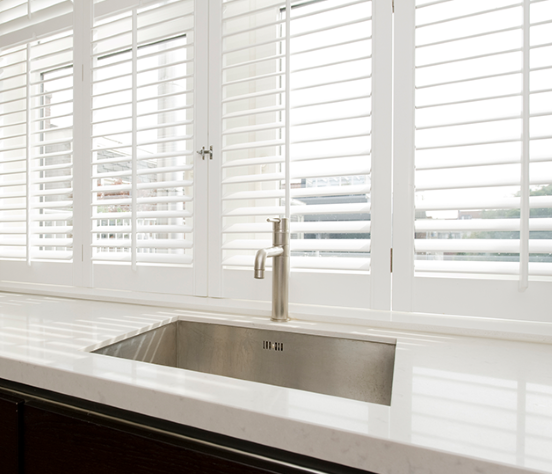 blins 1 New kitchen sink and new blinds.