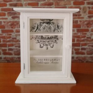 small cream curio shelf