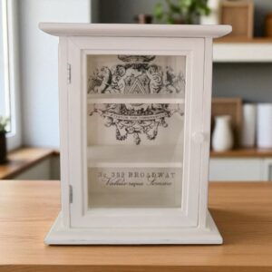 small cream curio shelf