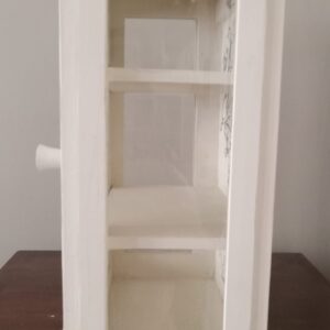 small cream curio shelf