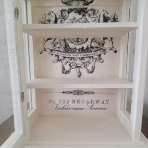 small cream curio shelf