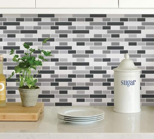splash Peel and stick black, white and gray backsplash in a updated kitchen.