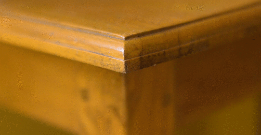 The edge of a wood table.