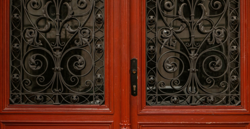 wood doors with iron grates.