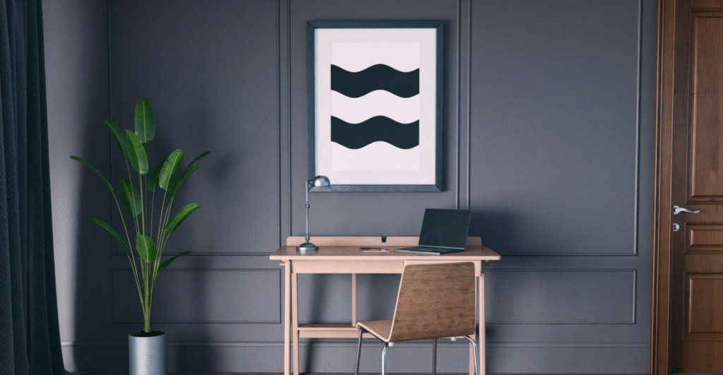 Desk and chair with wall art on the wall.